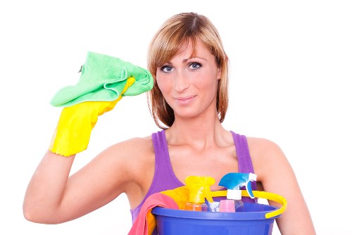 House cleaning tools and a tidy living room setup